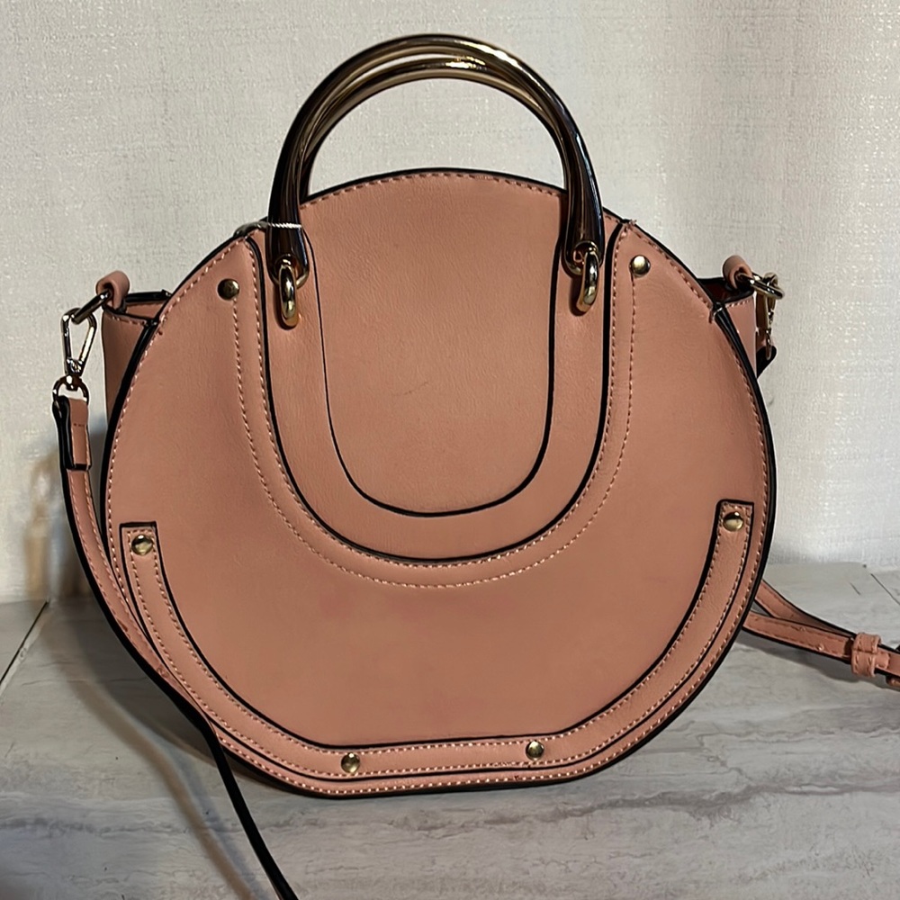 Pink Crossbody purse with handle an adjustable strap